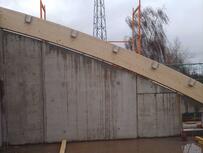 Seitenwand mit gerundeter Oberseite